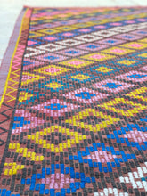 Load image into Gallery viewer, Handmade Turkish vintage Anatolian kelim rug "Neon Nomad" from Anatolia. Turkisk vintage kelim matta "Neon Nomad" från Anatolien. Tyrkisk vintage kelim tæppe "Neon Nomad" fra Anatolia. Tyrkisk vintage kelim teppe "Neon Nomad" fra Anatolia. Turkkilainen vintage kelim-matto Anatolialta "Neon Nomad".