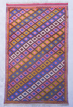 Load image into Gallery viewer, Handmade Turkish vintage Anatolian kelim rug "Neon Nomad" from Anatolia. Turkisk vintage kelim matta "Neon Nomad" från Anatolien. Tyrkisk vintage kelim tæppe "Neon Nomad" fra Anatolia. Tyrkisk vintage kelim teppe "Neon Nomad" fra Anatolia. Turkkilainen vintage kelim-matto Anatolialta "Neon Nomad".